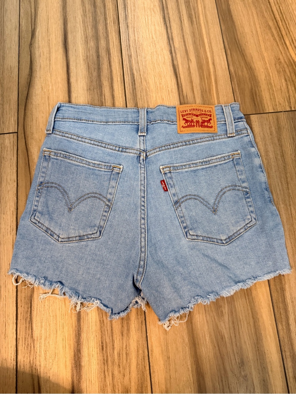 High-Rise Light Blue Denim Cutoff Shorts